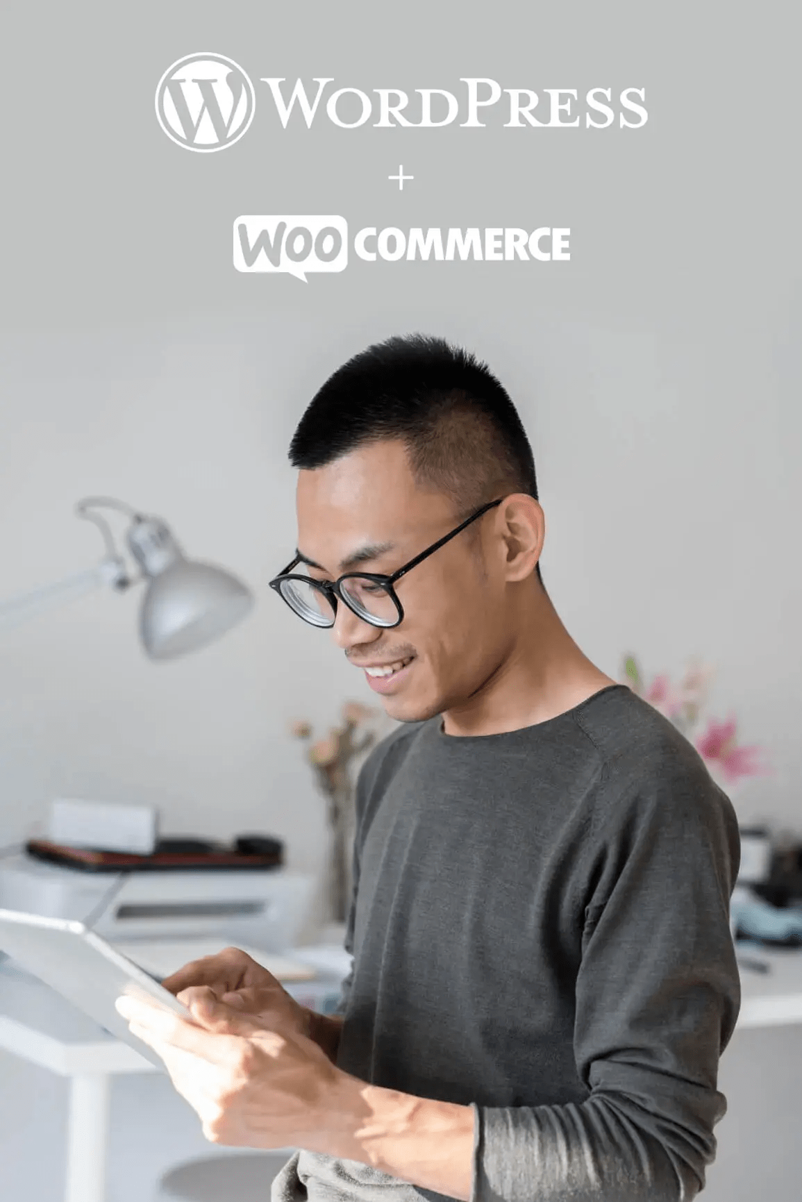 man smiling with ipad