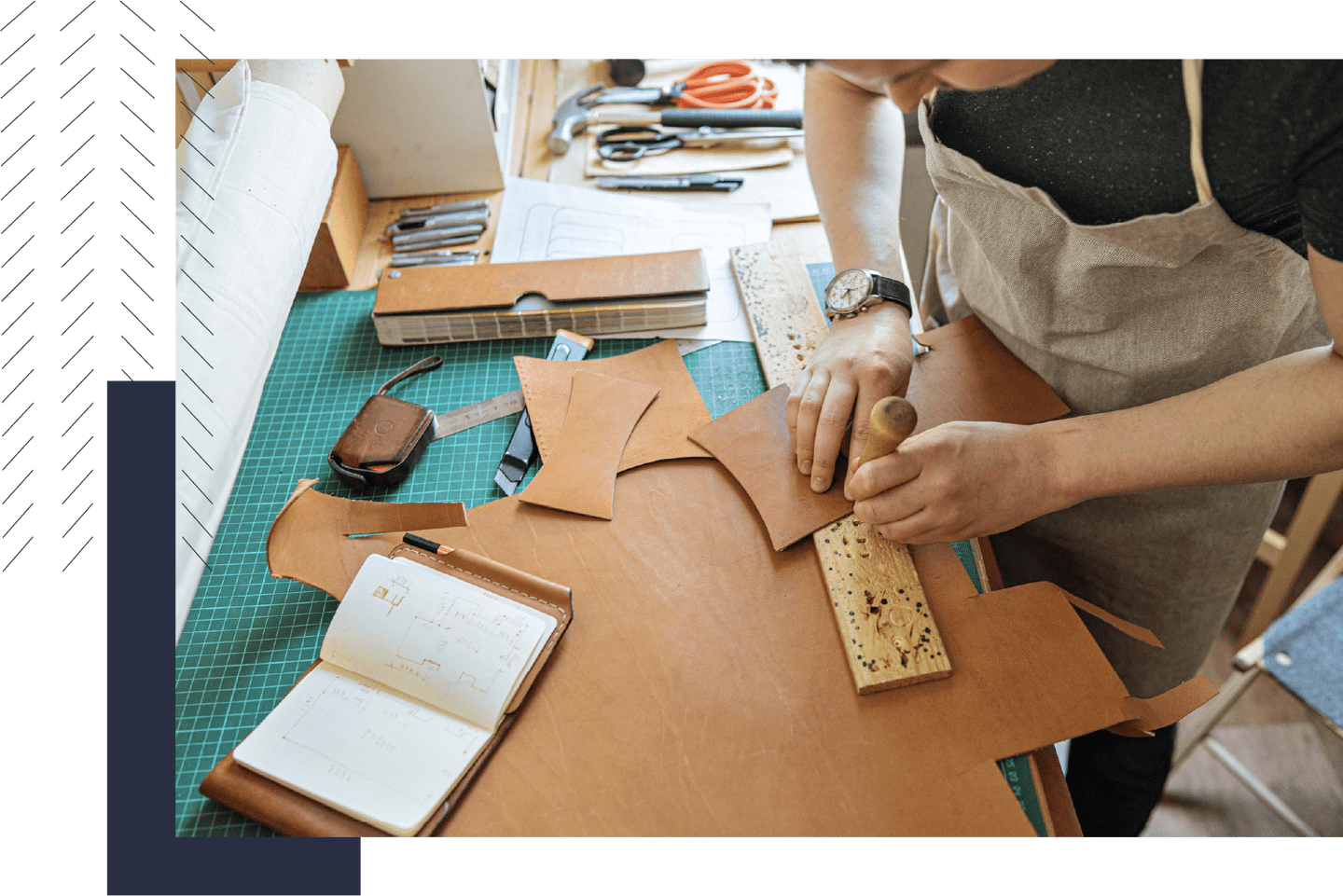Person cutting and carving pieces of leather